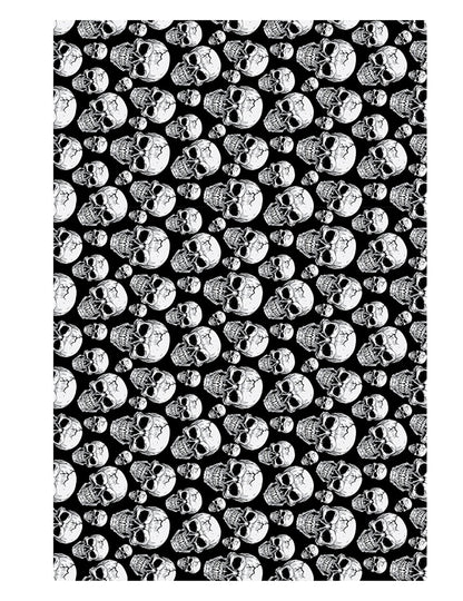 Nappe tête de mort noir et blanc avec motifs de crânes