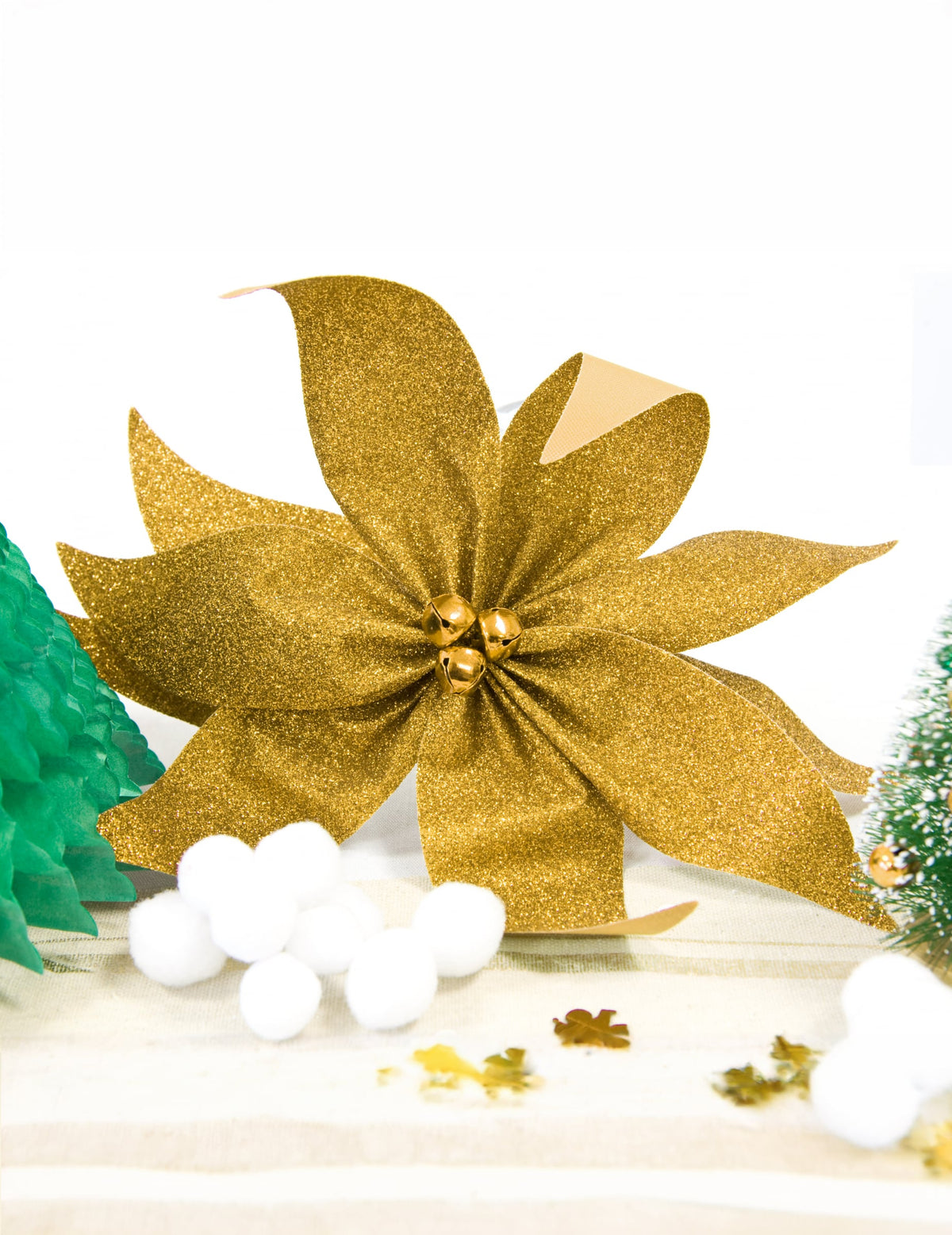 Nœud de poinsettia avec grelots pour table doré pailleté