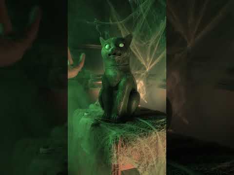Chat noir yeux brillants, sonore et lumineux 30 cm