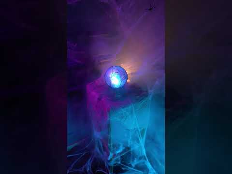 Boule de cristal lumineuse et sonore 19 x 13 cm