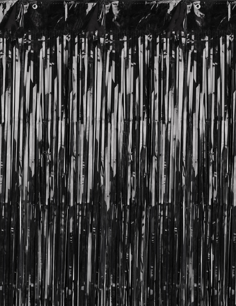 Détail de la texture du rideau scintillant noir pour décoration de fête