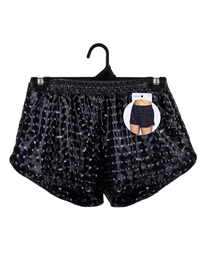 Vue sur cintre du short sporty pour femme noir brillant effet damier
