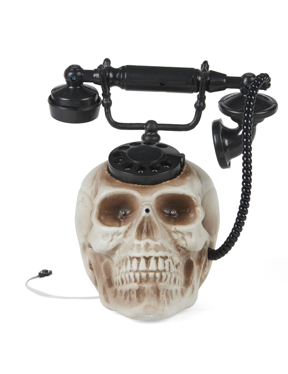 Vista geral com auscultador em forma de cabeça de morto na base do telefone