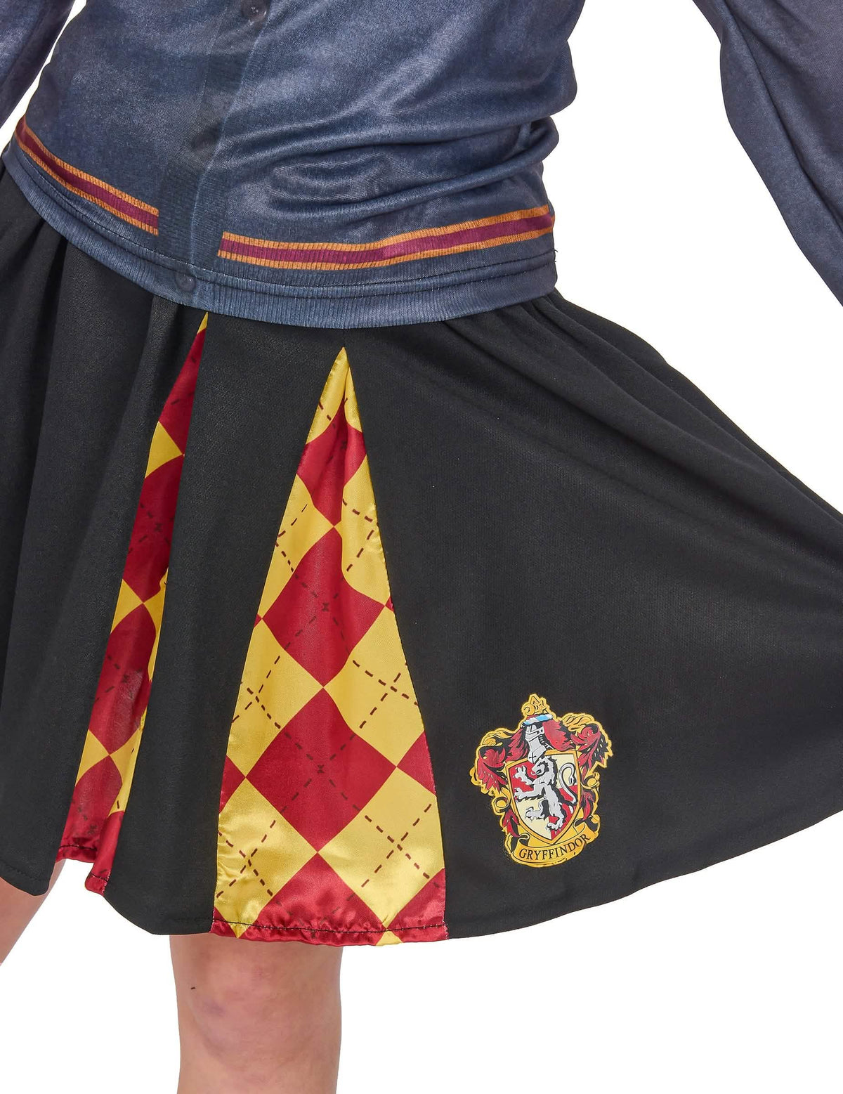 Detalhe do brasão e dos motivos da saia do top com saia Gryffindor Harry Potter