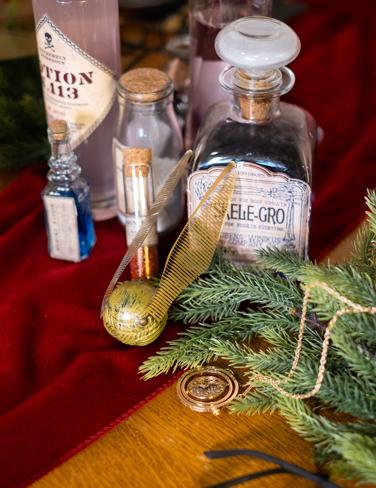 Mise en situation avec flacons de potions de l'accessoire Vif d'or Harry Potter